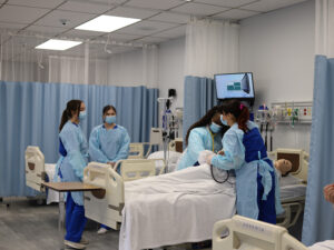 Students at work in the nursing simulation lab.