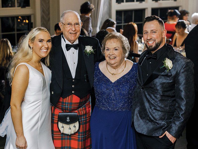 Bride and groom with grandparents