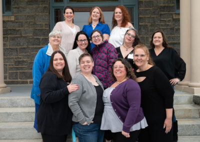 Group of women in front of college building