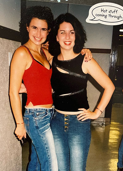 Two women in jeans and tank tops