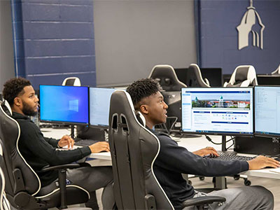 Two students working in computer lab