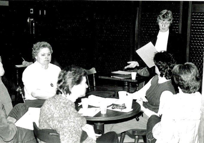 Black and white photo of women in a classroom