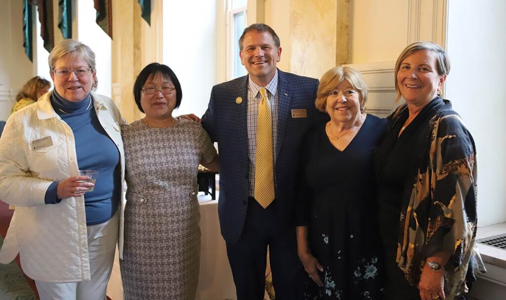 Five people looking at camera